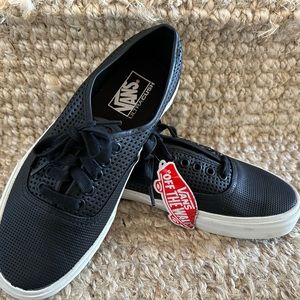 Black classic lace up Vans